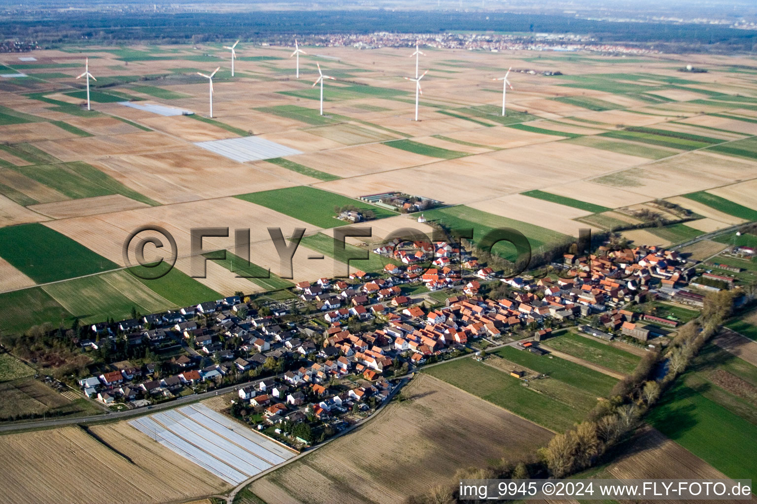 Wind turbine windmills on a field in Herxheimweyher in the state Rhineland-Palatinate