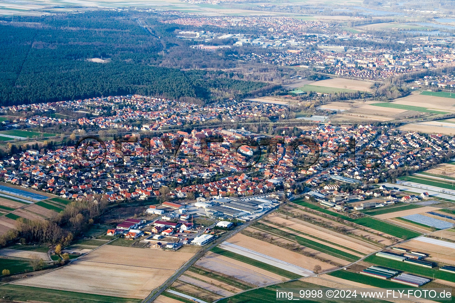 Oblique view of Town View of the streets and houses of the residential areas in Harthausen in the state Rhineland-Palatinate