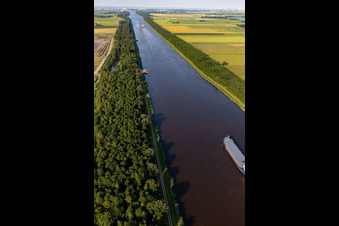 Aerial view of Channel flow and river banks of the waterway shipping Nordostseekanal in Buchholz in the state Schleswig-Holstein, Germany