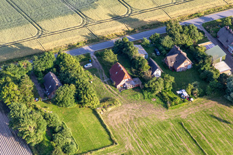 Former dike keepers' farms on Schülpersieler Straße in Wesselburenerkoog in the state Schleswig Holstein, Germany seen from above