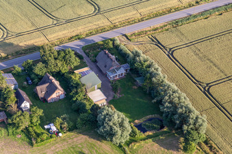 Bird's eye view of Former dike keepers' farms on Schülpersieler Straße in Wesselburenerkoog in the state Schleswig Holstein, Germany
