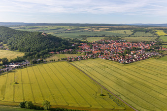 Village view on the edge of agricultural fields and land in Muehlberg in the state Thuringia, Germany