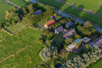 Schülpersieler Street in the district Schülperweide in Wesselburenerkoog in the state Schleswig Holstein, Germany seen from above
