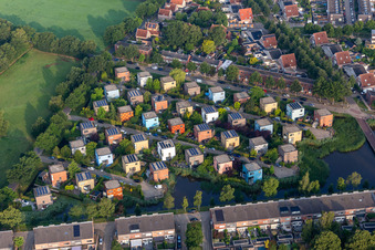 Aerial view of Residential area of coloured, cube-shapres, single-family design houses in settlement at shore areas in Enschede in Overijssel, Netherlands