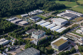 Industrial and commercial area with Akzo Nobel Powder Coatings GmbH, RET GmbH and Möbel Rieger Lager Reutlingen in the district Jettenburg in Kusterdingen in the state Baden-Wuerttemberg, Germany
