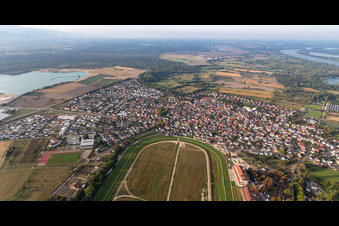 View of the town from the northeast with Baden Galopp - Galopprennbahn Baden-Baden in Iffezheim in the state Baden-Wuerttemberg, Germany