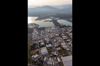 Aerial view of Industrial and commercial area Ost on Kuehlsee with ELMAKO GmbH & Co. KG, Kronimus AG Betonsteinwerk, IKE Iffezheimer Kies- and Edelsplittwerk Max Kern GmbH & Co. KG,BKG Transportbeton GmbH + Co. KG and SWA Suedwest Asphalt GmbH & Co. KG in Iffezheim in the state Baden-Wuerttemberg, Germany
