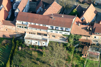 Half-timbered house and multi-family house- residential area in the old town area and inner city center Am Hinterstaedl in Jockgrim in the state Rhineland-Palatinate