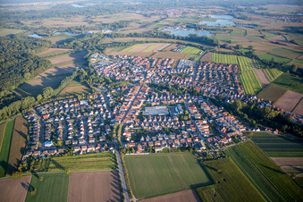 Village - view on the edge of agricultural fields and farmland in Kuhardt in the state Rhineland-Palatinate, Germany