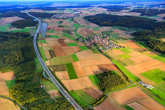 Village - view on the A3 from the northwest in the district Holzkirchhausen in Helmstadt in the state Bavaria, Germany