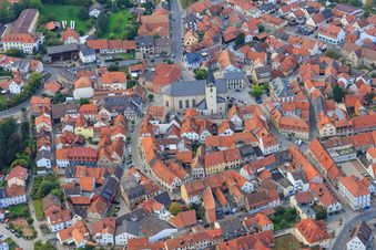 Aerial view of Church of St. Michael and John the Baptist on the market square in Eltmann in the state Bavaria, Germany