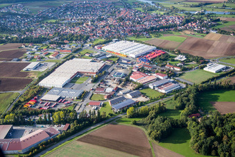 Aerial view of Industrial estate and company settlement Gewerbegebiet An of Siechkapelle in Knetzgau in the state Bavaria, Germany