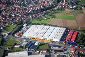 Oblique view of Industrial estate and company settlement Gewerbegebiet An of Siechkapelle in Knetzgau in the state Bavaria, Germany