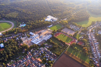 Industrial area Am Kleinwald from the southeast with Hubert Eichenlaub Transporte und Spedition GmbH and central sports facility in Herxheim bei Landau in the state Rhineland-Palatinate, Germany