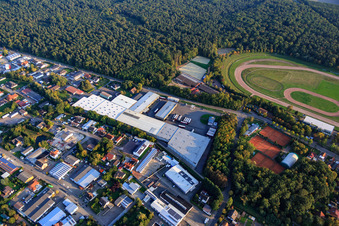 Industrial area Am Kleinwald from the southeast with Hubert Eichenlaub Transporte und Spedition GmbH and tennis courts in Herxheim bei Landau in the state Rhineland-Palatinate, Germany