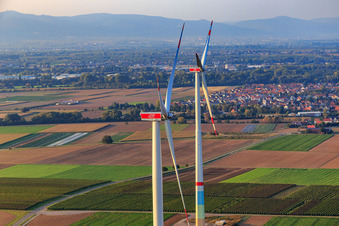 Village behind wind turbines in Offenbach an der Queich in the state Rhineland-Palatinate, Germany