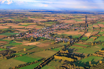 Village overview between autumnal fields and meadows from the west in Kapsweyer in the state Rhineland-Palatinate, Germany