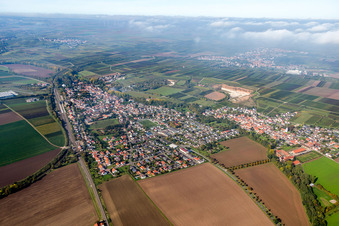 Village - view on the edge of agricultural fields and farmland in Monsheim in the state Rhineland-Palatinate, Germany