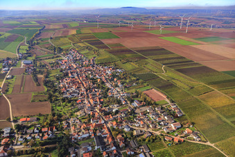 View of the village below autumnal vineyards from the east in Kindenheim in the state Rhineland-Palatinate, Germany