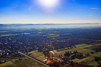 View of the town from the west at sunrise in the district Grosshausen in Einhausen in the state Hesse, Germany
