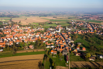 Village - view on the edge of agricultural fields and farmland in Rittershoffen in Grand Est, France