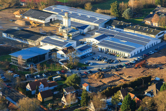 Oblique view of Quartier Lanzet from the south with Hagebau Kompakt - Gillet Baustoffe GmbH in Herxheim bei Landau in the state Rhineland-Palatinate, Germany