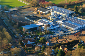 Oblique view of Quartier Lanzet from the east with Hagebau Kompakt - Gillet Baustoffe GmbH in Herxheim bei Landau in the state Rhineland-Palatinate, Germany