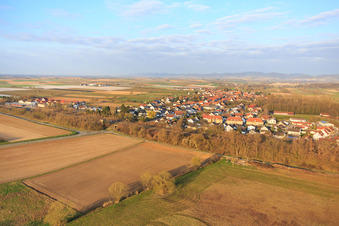 Along the railway line in winter in Winden in the state Rhineland-Palatinate, Germany from above