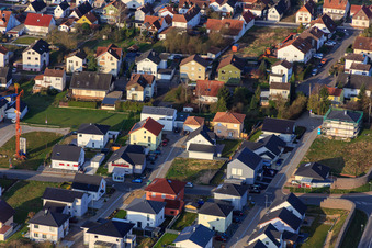 Oblique view of Holderbusch new development area from the northeast in Minfeld in the state Rhineland-Palatinate, Germany