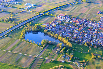 Village view at Kropsbach next to the A65 from the south in Kirrweiler in the state Rhineland-Palatinate, Germany