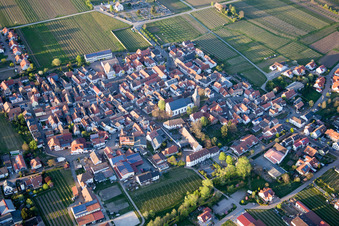 Village - view on the edge of agricultural fields and farmland in Kirrweiler (Pfalz) in the state Rhineland-Palatinate, Germany