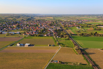 Aerial view of Village view along the railway line from the south in Alsheim in the state Rhineland-Palatinate, Germany