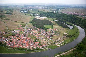 Village on the river bank areas of the loop of the river in Volkach in the state Bavaria, Germany