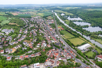 Aerial view of Village on the river bank areas of the Main river in Schonungen in the state Bavaria, Germany