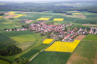 Village - view on the edge of agricultural fields and farmland in Ebertshausen in the state Bavaria