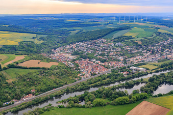 View of the town beyond the Main from the west in Schonungen in the state Bavaria, Germany