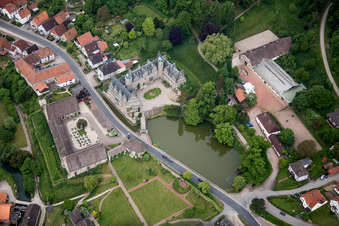 Aerial view of Building and castle park systems of water castle Schloss Haemelschenburg in the district Haemelschenburg in Emmerthal in the state Lower Saxony, Germany