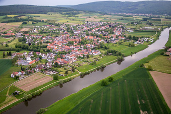 Village on the river bank areas of the Weser river in Wahlsburg in the state Hesse, Germany