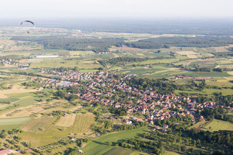 Village - view on the edge of agricultural fields and farmland in Preuschdorf in Grand Est, France