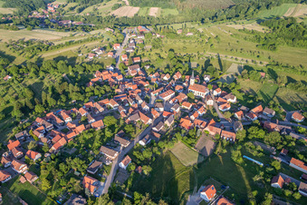 Village - view on the edge of agricultural fields and farmland in Wingen in Grand Est, France