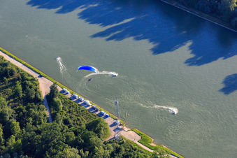 Aerial photograpy of Water scooter vs. paraglider in or over the Rhine in the district Leopoldshafen in Eggenstein-Leopoldshafen in the state Baden-Wuerttemberg, Germany