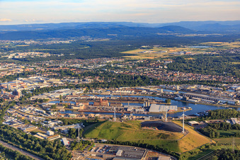 Aerial view of Verkehrs Betriebe Karlsruhe GmbH - Depot West and Windpark Deponie West (Energieberg) in front of the Karlsruhe Rhine ports from the north in the district Knielingen in Karlsruhe in the state Baden-Wuerttemberg, Germany