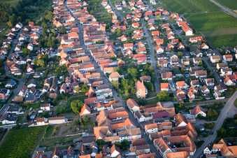 Village - view on the edge of agricultural fields and farmland in Freimersheim (Pfalz) in the state Rhineland-Palatinate, Germany