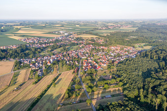 Village - view on the edge of agricultural fields and farmland in Scheibenhardt in the state Rhineland-Palatinate, Germany