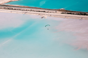 Brown - white salt fields for salt production in Rosières-aux-Salines in the state Meurthe et Moselle, France seen from above