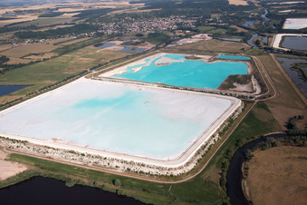 Brown - white salt fields for salt production in Rosières-aux-Salines in the state Meurthe et Moselle, France from the plane
