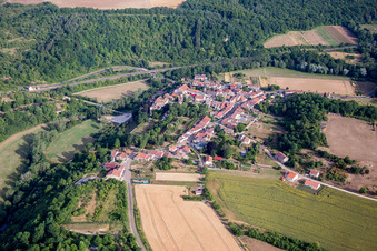 Aerial view of Village - view on the edge of agricultural fields and farmland in Jaulny in Grand Est, France