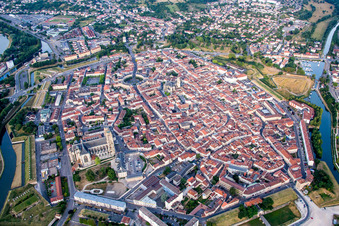 City center in the downtown area on the banks of river course Mosel in Toul in Grand Est, France