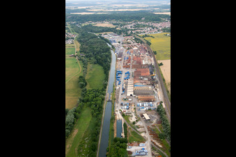 Aerial view of Building and production halls on the premises of Foundery Saint Gobain PAM on Canal de la Marne au Rhin in Foug in Grand Est, France
