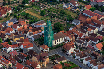 Oblique view of Catholic church scaffolded by Leidner GmbH Gerüstbau, Landau in Ottersheim bei Landau in the state Rhineland-Palatinate, Germany